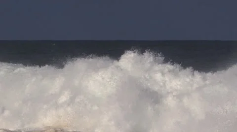 A breaking wave filling the frame before subsiding Stock Footage 59525516