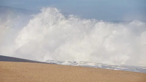 A breaking wave at Ke Iki beach on the North Shore, Oahu, Hawaii. Stock Footage 218635252