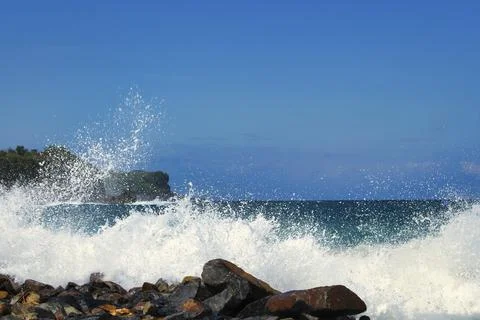 Breaking Wave on The Rock Stock Photos