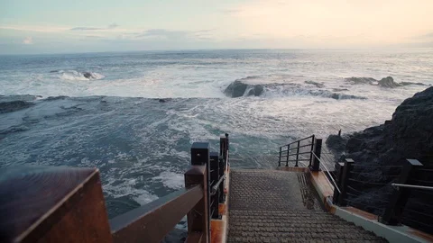 Breaking Wave Before Sunset. Down Stairs Unable to Enter 스톡 동영상 128947796