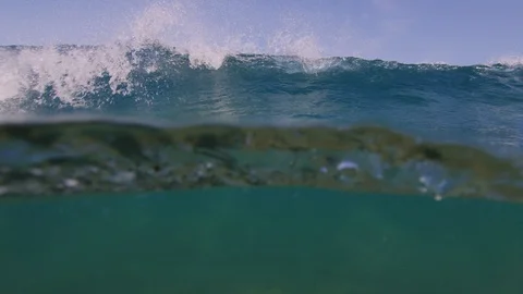 Breaking wave under the water / slow-motion from underwater / 4K 120p Stock Footage 121859999