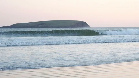 Breaking Waves and Dark Island Stock-Footage 97933678