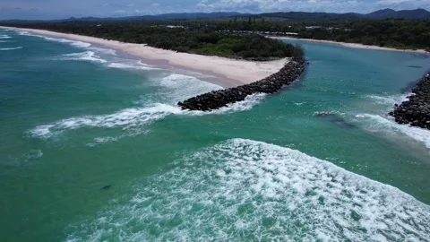 Breaking Waves Coming To The Mouth Of Mooball Creek And Beach With Shark And Stock Footage 330976486
