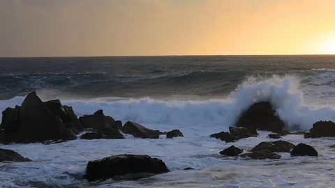 Breaking of waves during sunset on the island of La Gomera Stock Footage 106008450