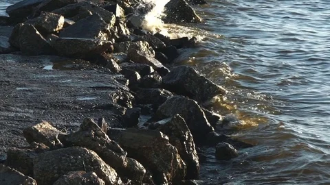 Breaking waves on rocks Stock Footage 81397575