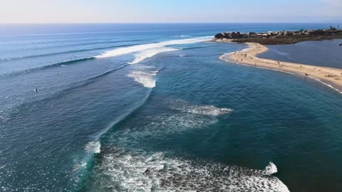 Breaking Waves Roll Toward Malibu Lagoon Sandbar, 4K Aerial Stock Footage 346546410