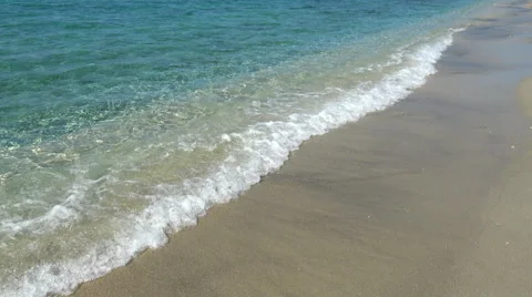 Breaking waves on a sand beach Stock Footage 68630230