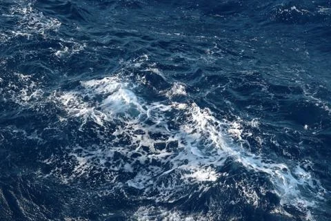 Breaking Waves on the sea. Background space for writing and projects. Stock Photos