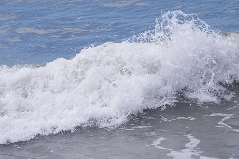 Breaking waves on the seashore Stock Photos