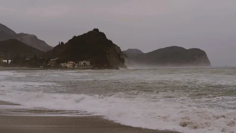 Breaking waves on stone Adriatic Sea coast, Petrovac Video stock 102863054
