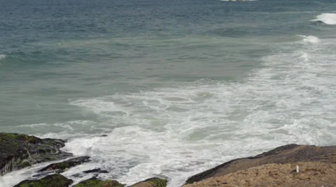 Breaking Waves on the Stones - Pan Stock Footage 32153204