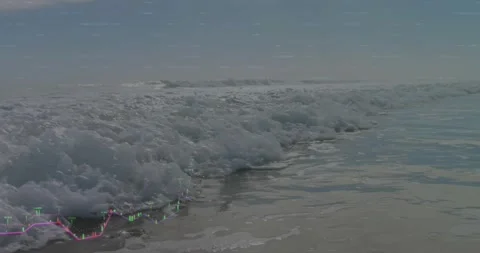 Breaking waves surging shore sparking finance chart showing market surge Stock Footage 332285590