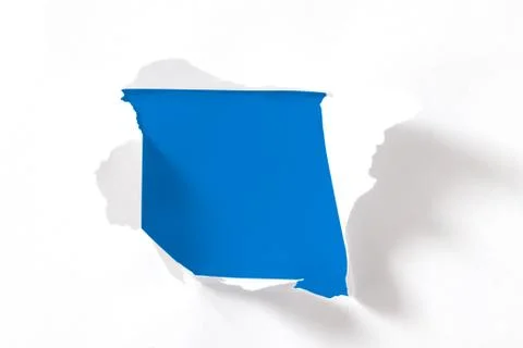 Breakthrough paper hole Stock Photos