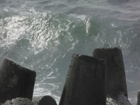 Breakwater and waves Stock Footage 80671830