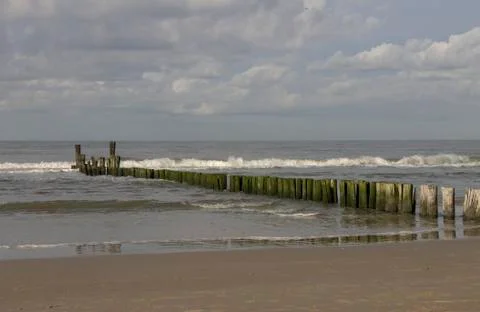 Breakwater at the beach Stock Photos