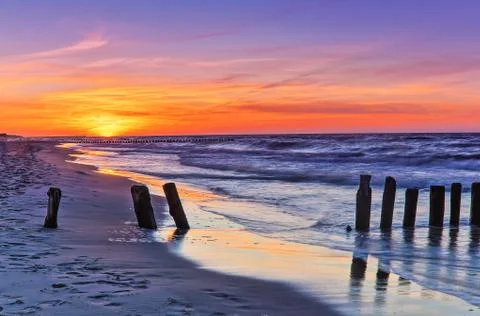 Breakwater during sunset Foto stock