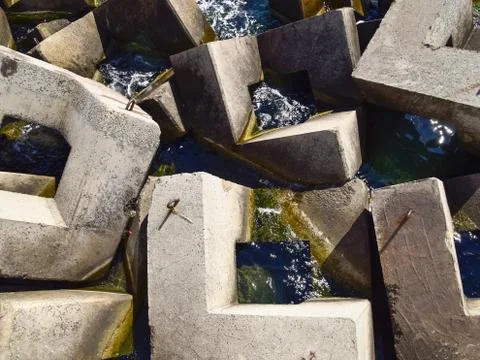 Breakwater of the rectangular stone figures. Foto stock