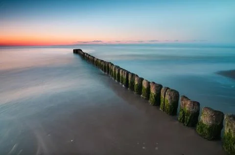 Breakwater sunset Stock Photos