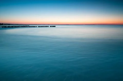 Breakwater sunset Фото