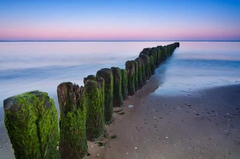 Breakwater sunset Stock Photos
