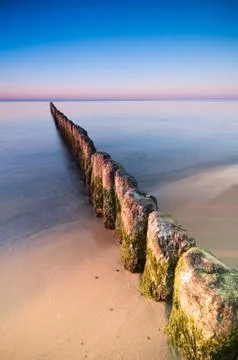 Breakwater sunset Stock Photos