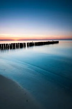 Breakwater sunset Stock Photos