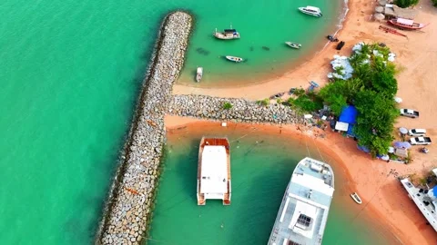 Breakwaters are often constructed using a variety of materials. Stock Footage 249727364