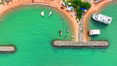 Breakwaters protect coastlines by breaking waves. Stock Footage 249727016