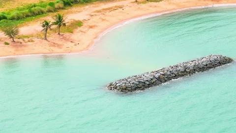Breakwaters protect coastlines by breaking waves. Stock Footage 249727488