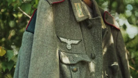 Breast Eagle close up, symbol on tunic chest. German Wehrmacht private soldier Stock Footage 325297833