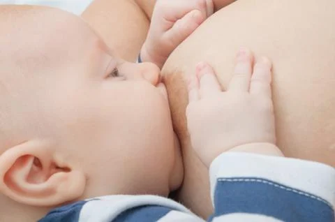 Breast feeding Stock Photos