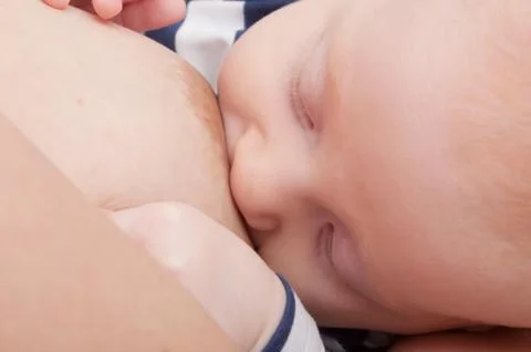 Breast feeding Stock Photos