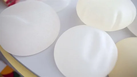 Breast implants on the table at beauty clinic office Stock Footage 70167048