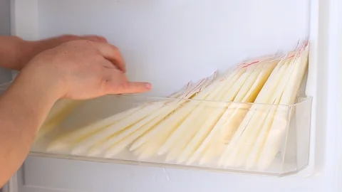 Breastmilk storage in the refrigerator Stock Footage 88088178