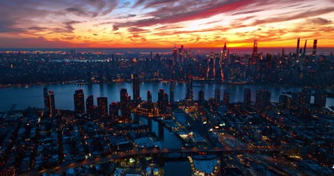 Breath-taking colorful cloudy sky over the metropolis at sunset. Dusk time Stock Footage 336193023