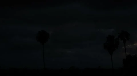 Breath taking time lapse clip of sun opening up through thick clouds Stock-Footage 50361943