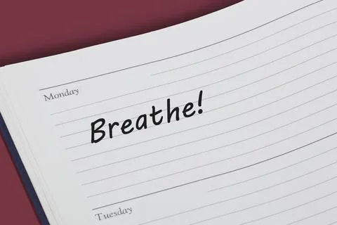 Breathe reminder message in an open diary Stock Illustration