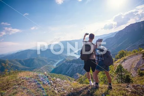 Breathing the fresh mountain air and taking photograps. Stock Photos