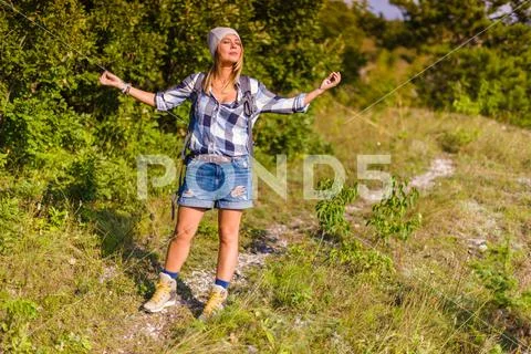 Breathing the fresh mountain air. Stock Photos