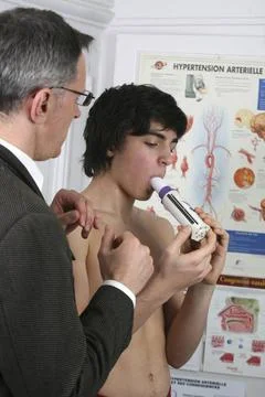  Breathing, spirometry adolescent Model and doctor. model release Copyrigh... Stock Photos
