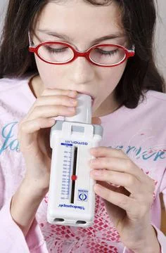  Breathing, spirometry in a child Breathing, spirometry in a child. Copyri... Stock Photos