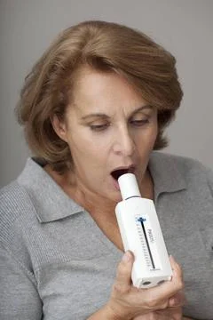 Breathing, spirometry elderly person Spirometry consist in measuring the v... Stock Photos
