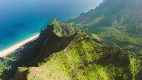 Breathtaking aerial dramatic mountains ocean on Napali Coast Kauai island Hawaii Video stock 203010800
