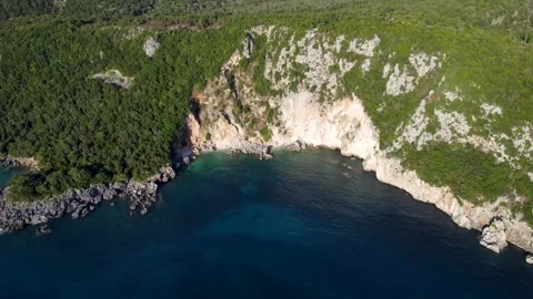 Breathtaking aerial drone view of the dramatic mountain and sea interface. Video stock 347228771