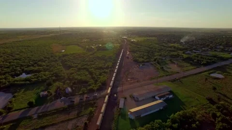 Breathtaking aerial of a freight train passing through countryside Stock-Footage 53118640