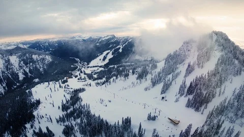 Breathtaking Aerial Over Chairlifts at Ski and Snowboard Winter Resort Stock Footage
