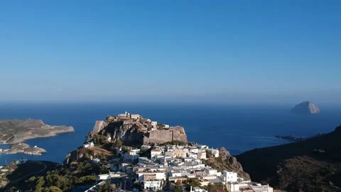 Breathtaking aerial panoramic view over Chora, Kythera by the Castle at sunse Stock Footage 198606027