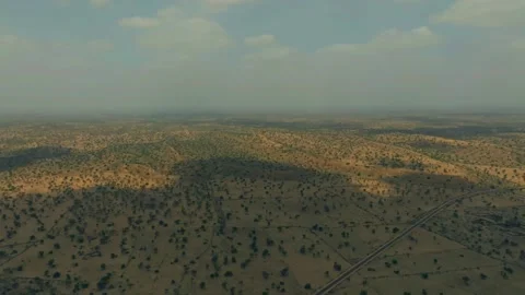 A breathtaking aerial shot capturing a wild eagle soaring gracefully above the Stock Footage 342482786