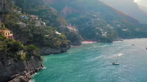 Breathtaking Aerial View of Coastal Cliffs and Turquoise Waters Stock Footage 323301700