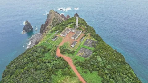 Breathtaking Aerial View of Farol do Rosais Lighthouse on Scenic Island Cliff Stock-Footage 330987313
